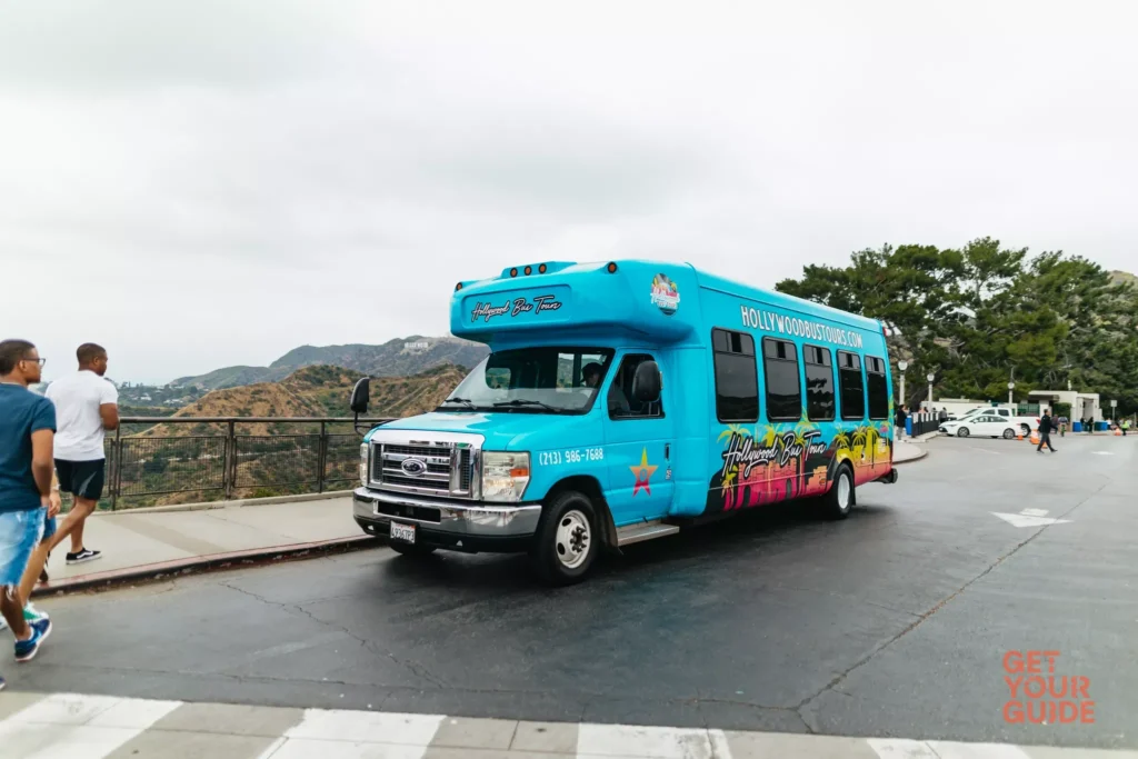 Hollywood Bus Tours sightseeing bus at Griffith Observatory viewpoint