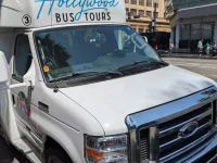 Hollywood Bus Tours vehicle parked on Hollywood Boulevard Los Angeles