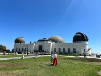 Griffith Observatory building in Los Angeles with visitors outside