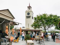 Original Farmers Market clock tower with outdoor seating Los Angeles