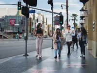 Private Hollywood tour guests walking along Hollywood Boulevard