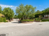 Beverly Hills gated luxury celebrity home entrance in Los Angeles