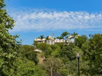 luxury mansion on hillside in Beverly Hills neighborhood