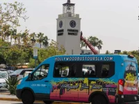 Hollywood Bus Tours vehicle parked near Original Farmers Market Los Angeles