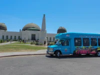 Hollywood bus tour parked near Griffith Observatory in Los Angeles
