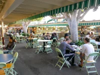 people dining at the Original Farmers Market Los Angeles outdoor seating area