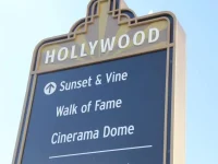 Hollywood landmark directional sign showing Walk of Fame and Sunset and Vine